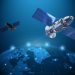 گوگل در حال آماده شدن برای راه اندازی یک مرکز داده آزمایشی به فضا است 8 Two satellites with large solar arrays orbit a glowing blue Earth, illustrating space technology and communication links.