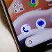 گوگل یک تغییر آزاردهنده در اپلیکیشن Phone را برطرف می کند 8 Close-up of a smartphone home screen with app icons, including Google and Chrome, on a curved display edge.
