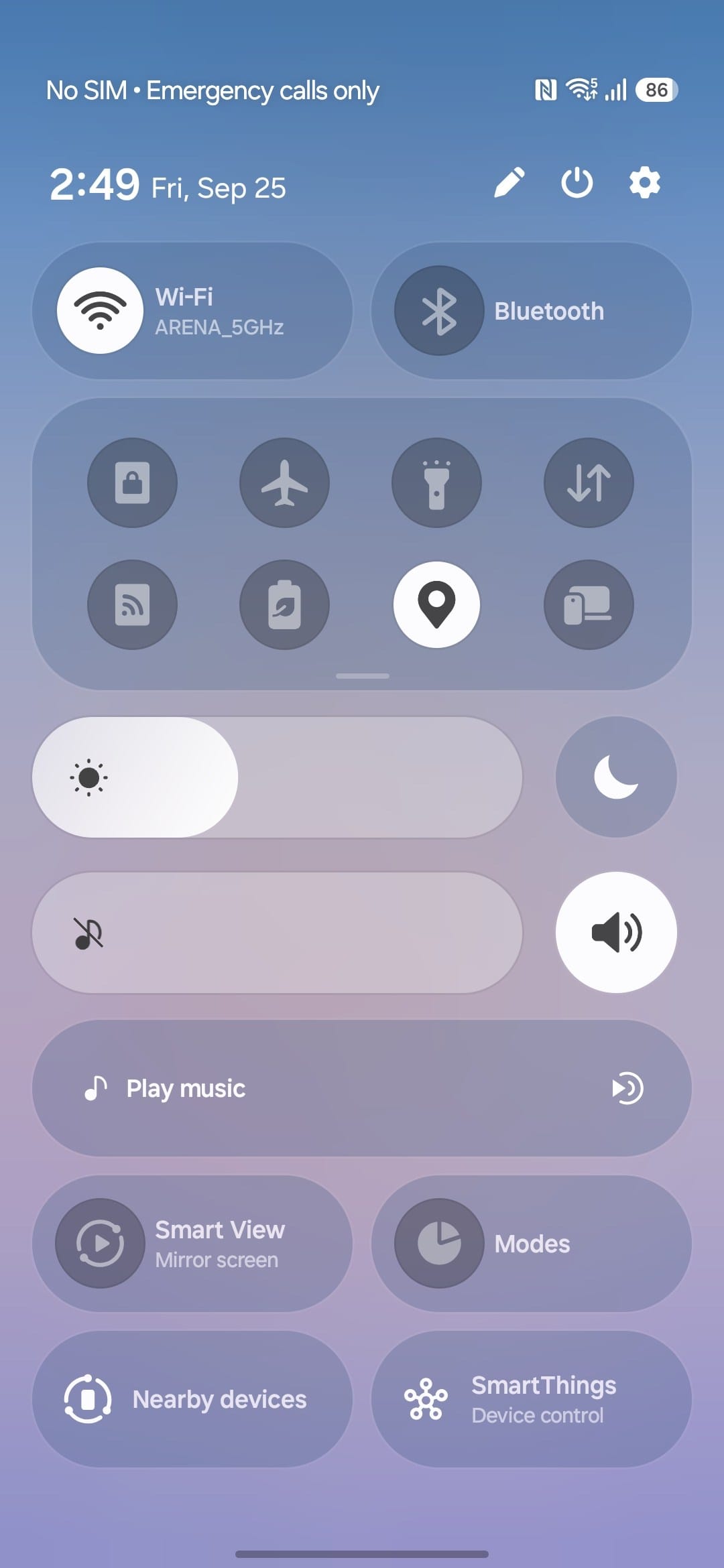 gsmarena_013-1 Control center with quick settings: Wi‑Fi, Bluetooth, airplane mode icons, and brightness/volume sliders visible at top and middle of screen.