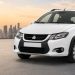 شرایط فروش چهار محصول سایپا اعلام شد. شروع ثبت نام از 14 مهرماه 8 White compact SUV parked on a rooftop with a city skyline at sunset.