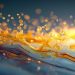 تولید هیدروژن از آب با نور؛ محققان ماده جدیدی را ایجاد کرده اند 8 Golden liquid splashes across a blue surface with glowing droplets and a warm sunset glow in the background.