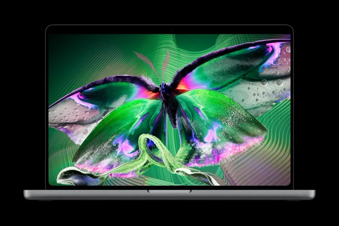 Apple-MacBook-Pro-with-PROLED-XDR-Display-QuickTime-261028_bigjpgsmall_2x اپل اولین مک بوک دیجینوی لمسی خود را معرفی کرد