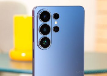 Blue smartphone rear with four camera lenses arranged in a vertical cluster and a small flash.
