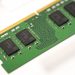 مدیران حافظه انتظار دارند کمبود RAM تا سال 2028 ادامه داشته باشد 8 Green RAM module with a gold edge connector and black memory chips visible on a green PCB, seen at an angle.